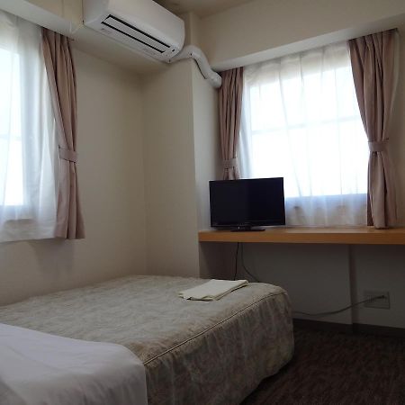 Ushiku City Hotel Ekimaekan Buitenkant foto