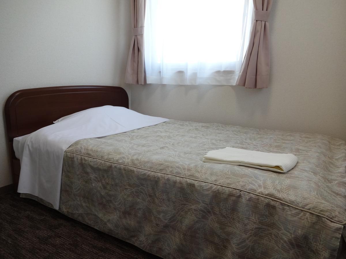 Ushiku City Hotel Ekimaekan Buitenkant foto