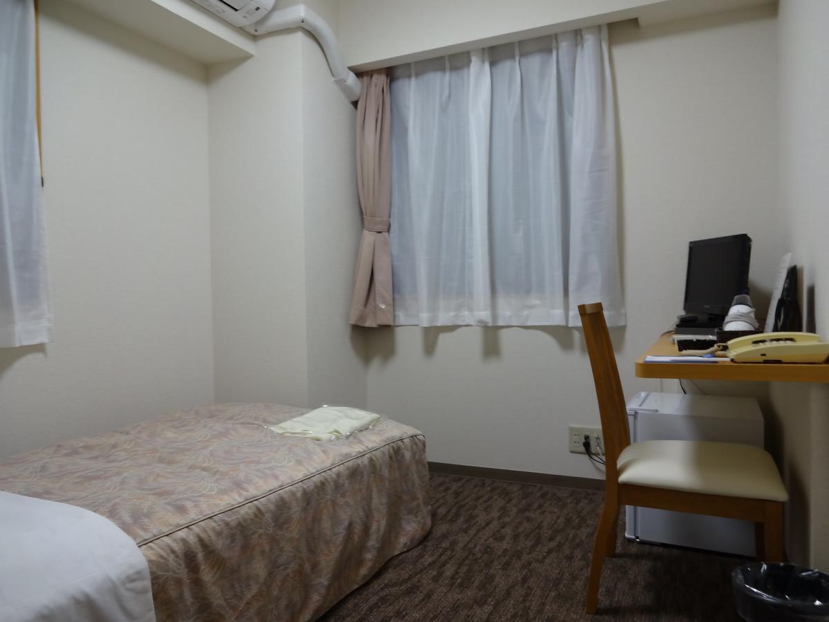 Ushiku City Hotel Ekimaekan Buitenkant foto