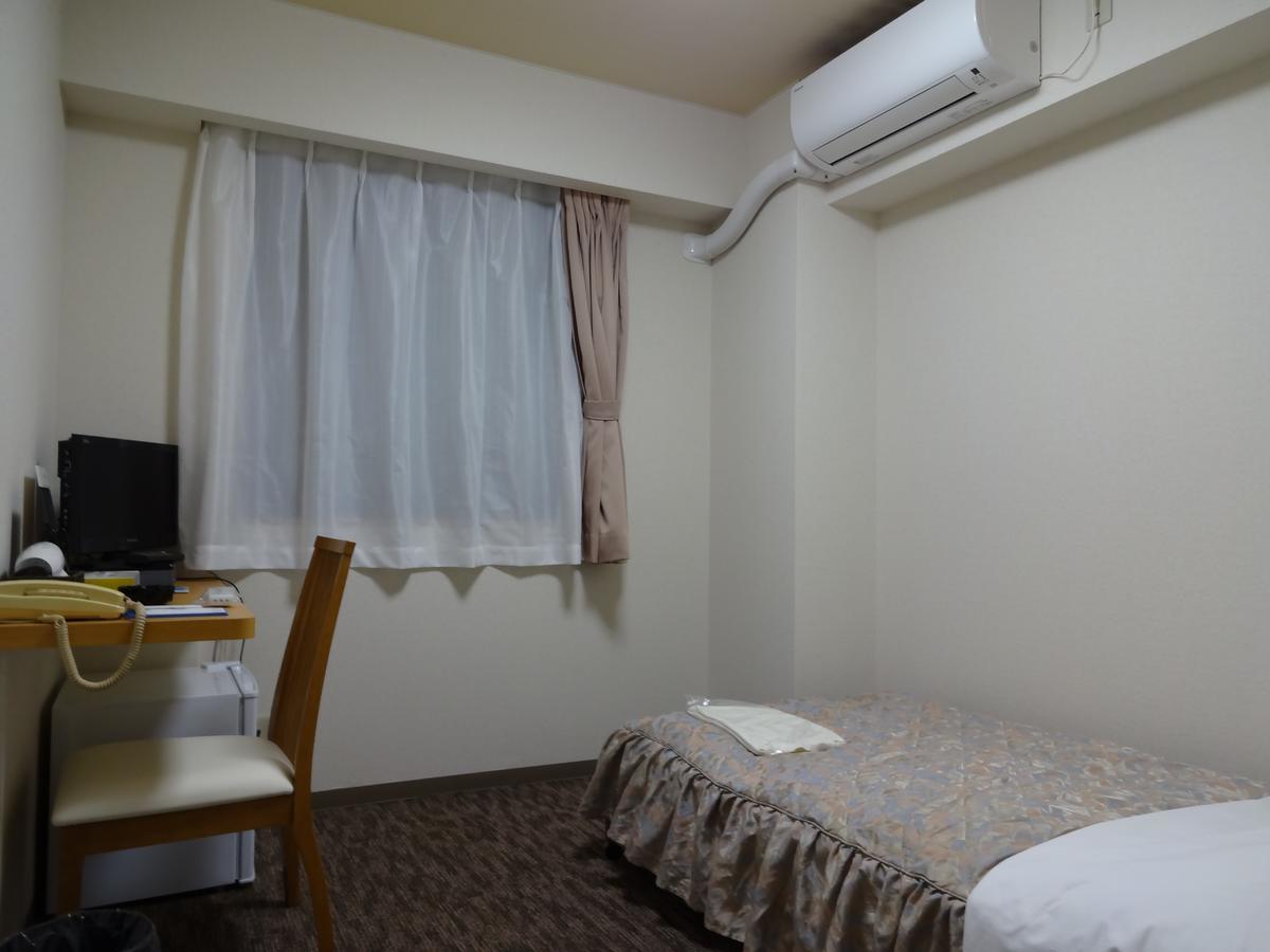 Ushiku City Hotel Ekimaekan Buitenkant foto